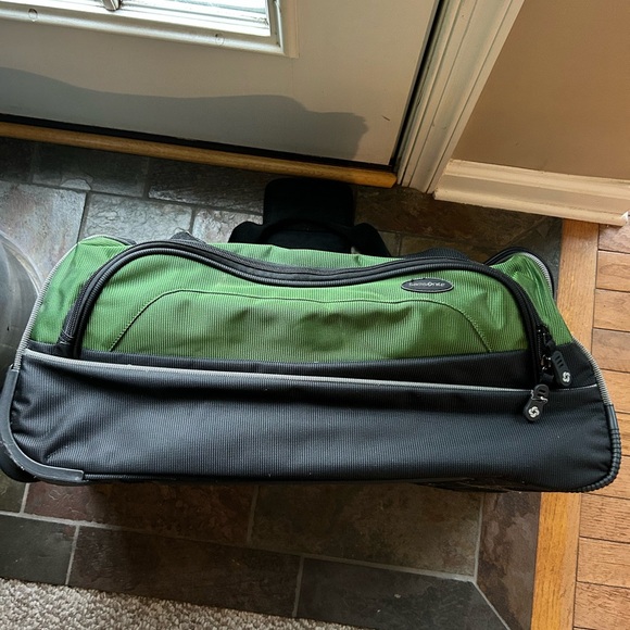 Samsonite Green and Black rolling duffel travel bag